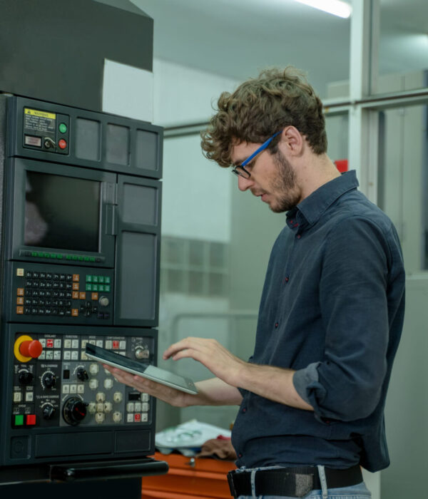 Factory technicians checking and the machine in factory,work at manufacturing plant factory,Technical specialist mechanics at heavy industry factory concept.